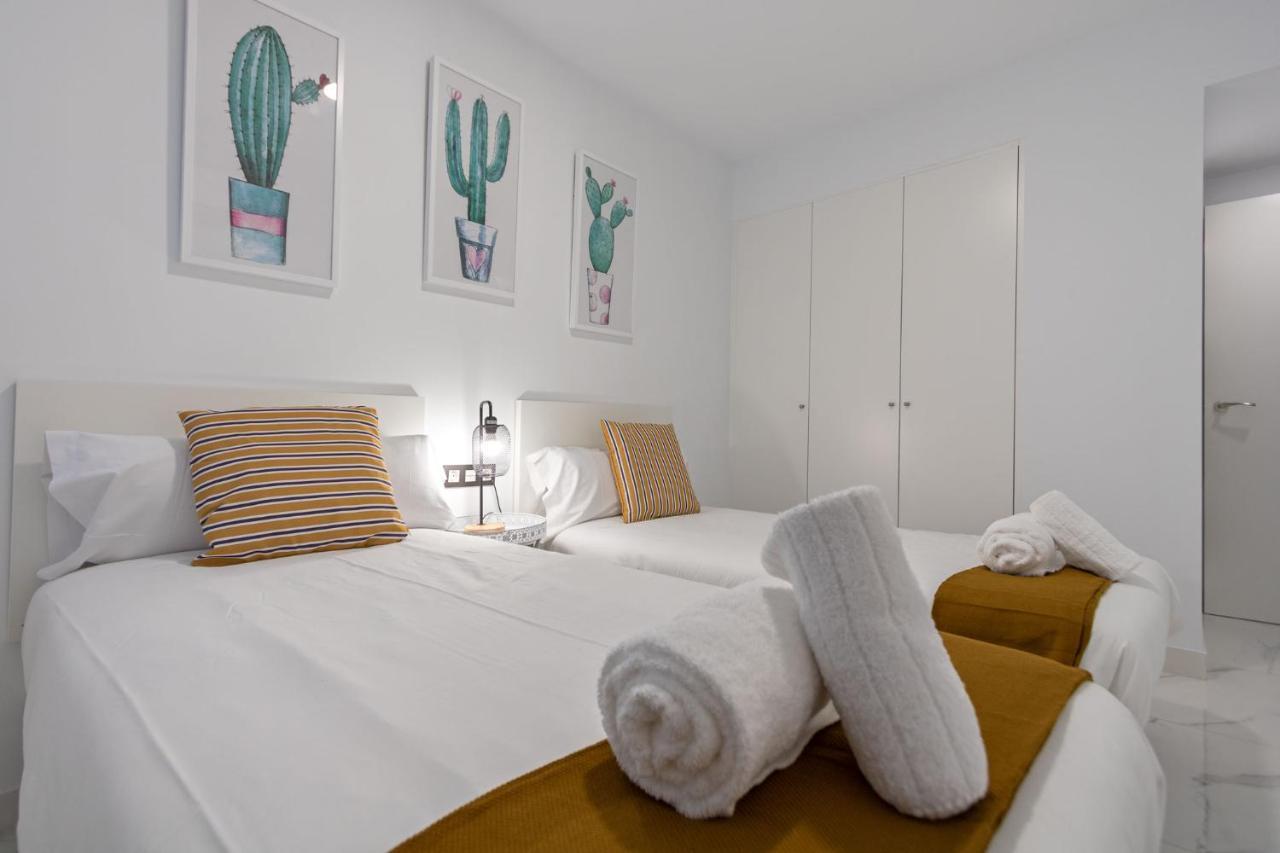 Lujan Deluxe Suites Sevilla Buitenkant foto